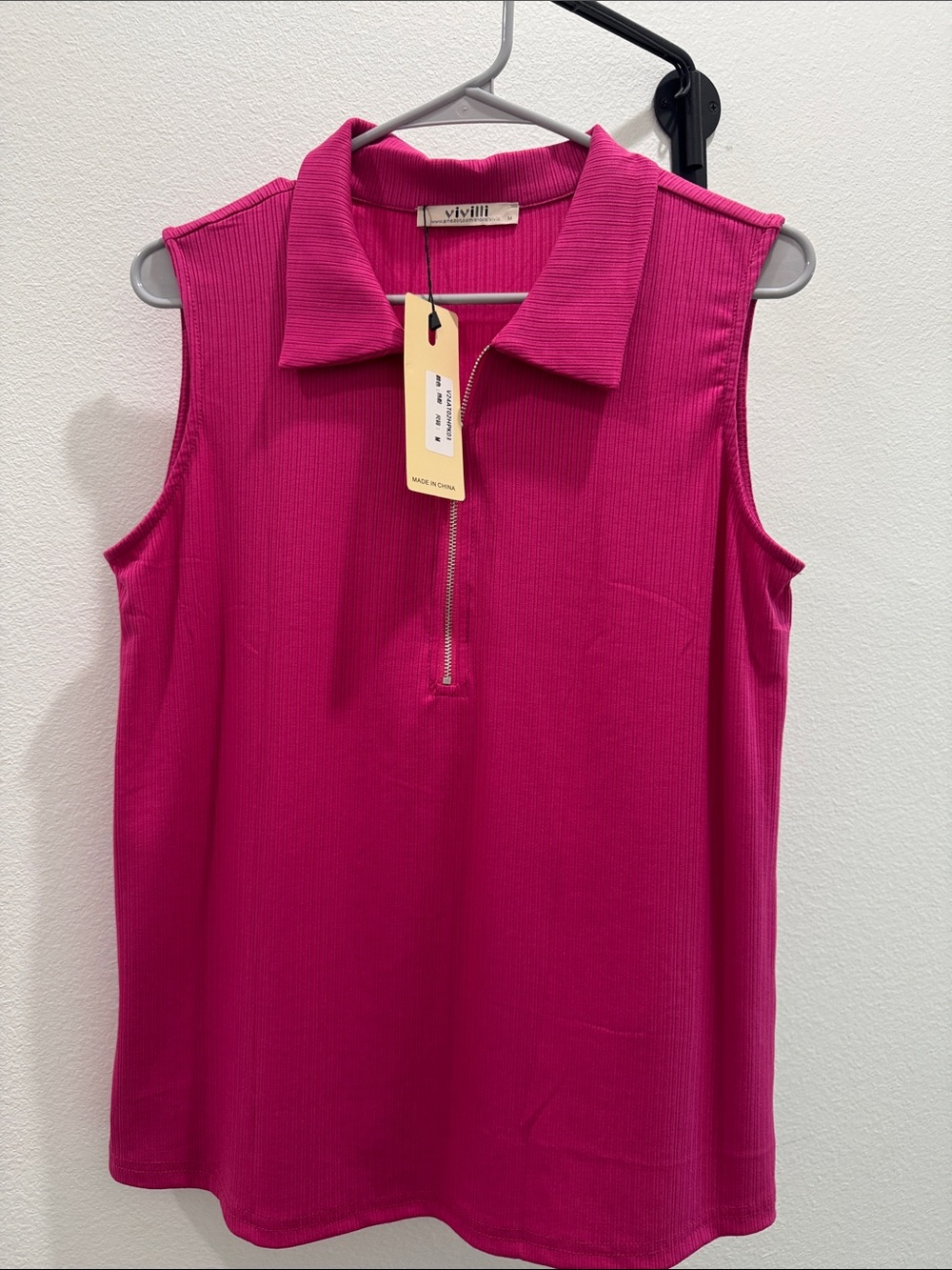 ViVI Sleeveless Zip Polo Top in Bright Fuchsia
